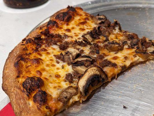 Mushroom and beef pizza