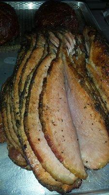 Now that's a smoked ham! Sprinkled with our special seasoning. Also comes with glaze if you like.  Order one for your family today.