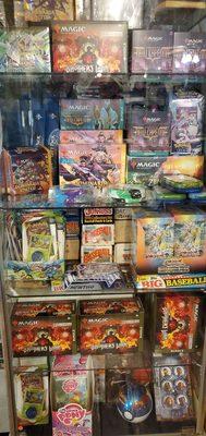 CHICO MAGIC carries a lot of collectible card games at very fair prices. (MTG, POKEMON, and Yugioh ) shown in pic.