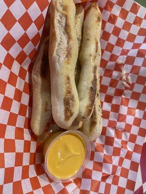 Classic breadsticks with cheese and garlic butter.