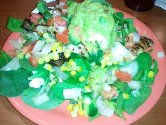 Fajita chicken salad: spinach, corn, fajita chicken, grilled onions/peppers, pico & guac...Weight Watchers friendly