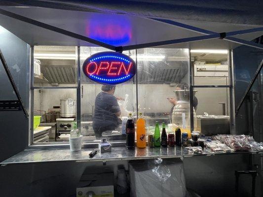 Immaculately clean and visible cooking area.