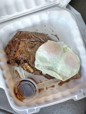 Ribeye with overeasy eggs