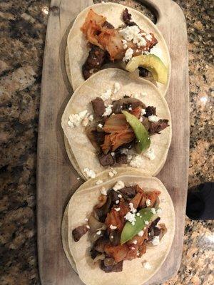 Short rib tacos with Avocado short ribs and kimchi