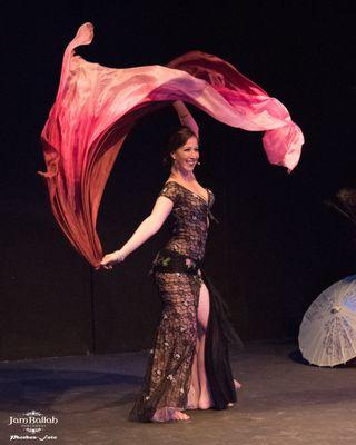 Raqs sharqi (belly dance) performance with veil.