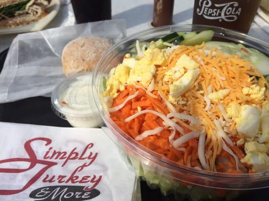 Garden salad with a roll