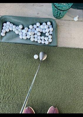 Artificial green at driving range