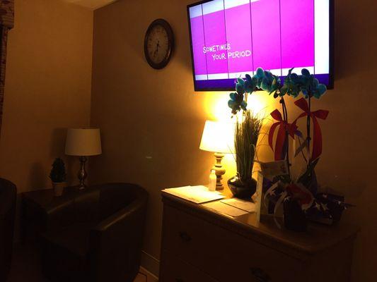 Dresser area and LCD TV in the Suite