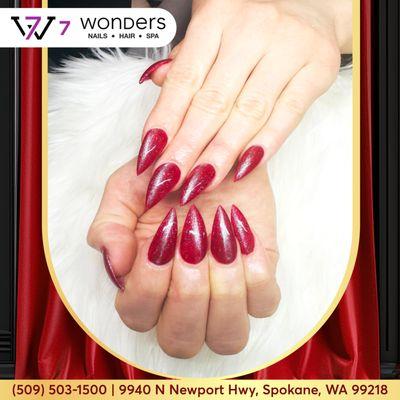 Command attention with stunning red nails, exuding confidence and allure for a bold and captivating manicure statement.