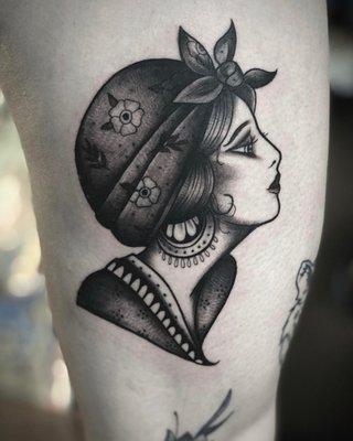 Gypsy Head on my thigh by Trav's tattoos