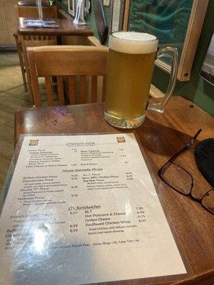 Menu and tall, cold beer.