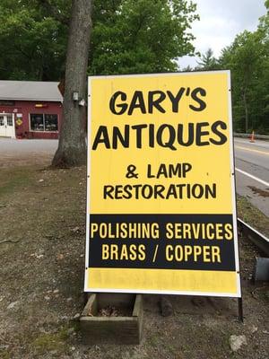 Street sign out front of Gary's Antiques