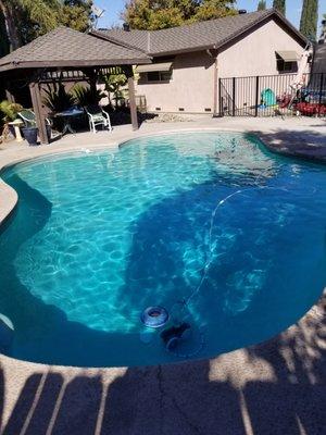 Residential swimming pool in Modesto after pool service.