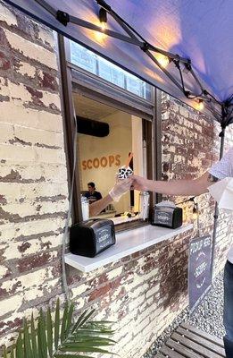 Magic window dispenses ice cream