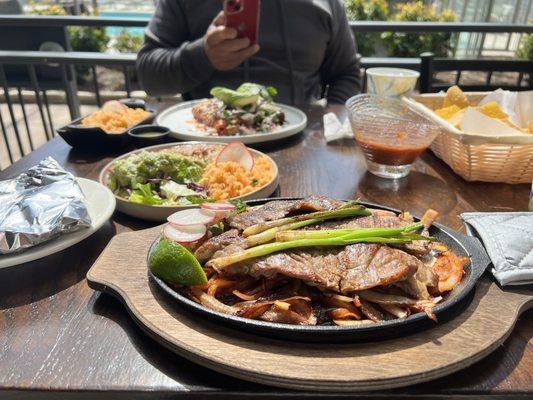 Arrachera plate, tatemada salsa and chips, & enchiladas plate