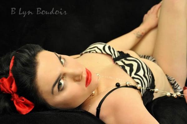 {A} enjoying her session at the Dayton boudoir photography company B Lyn Boudoir.