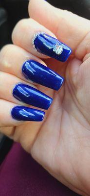 Owner Tina added bling but didn't clean up blue from cuticle