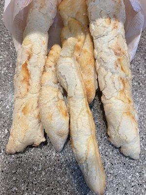 I don't know how to describe the breadsticks! Old dough and no toppings or butter but on it.