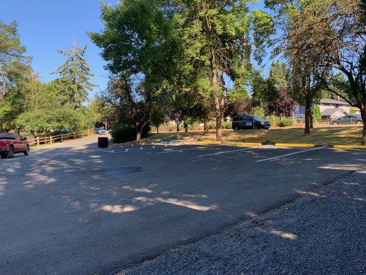 Parking lot with driving entrance visible on the left.