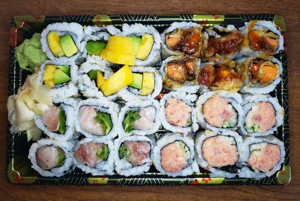 Mango Avocado [Top Left]; Sweet Potato [Top Right]; Yellowtail Jalapeño [Bottom Left]; Spicy Tuna [Bottom Right]