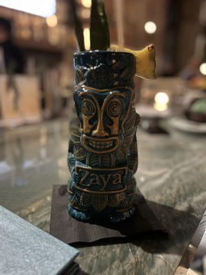 POG- pineapple, orange and guava juice in a tiki glass