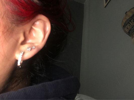 two lobe piercings on my left ear:)(already had the hoop)