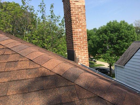 Checking a chimney flashing.