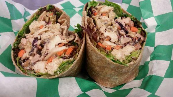 Our Chicken-Slaw Wrap on Whole Wheat. Red Cabbage, Apple, and Carrots tossed with Chicken in our Cucumber-Avocado Slaw Sauce.