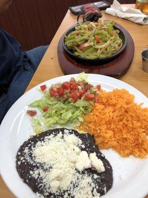 Veggie fajitas with black beans and rice