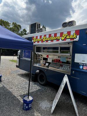 The side angle of food truck.