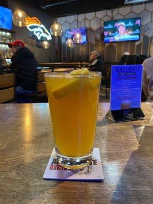 Blue moon on tap with an orange slice