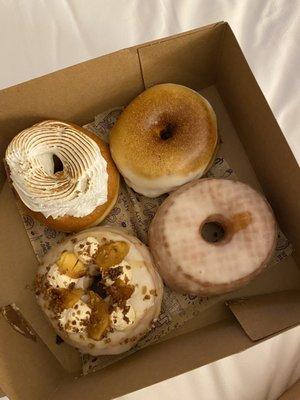 Tres leches, glazed, s'mores, and apple donuts