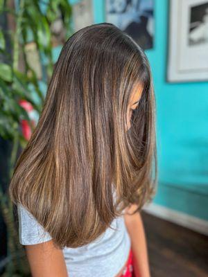 Highlights and haircut refresh by Nicha. The goal was to have brighter pops of highlights while still looking natural.