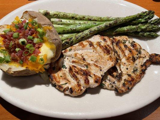 Fire-Grilled Chicken Breast with loaded baked potato and grilled asparagus. Yummy yum yum yum