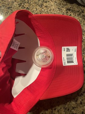 Nike Red cap shipping with a security tag