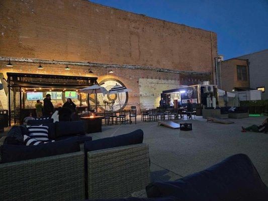 The outdoor area where we are parked, right next to Barnett's Whiskey House