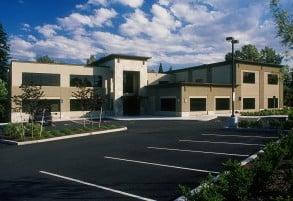 Our building, Clackamas River Plaza. We back the Clackamas River at High Rocks.  We are right inside the front door, Suite 100.