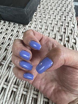 Uneven nails. Long, short, crooked and not squared off as I asked for. Terrible manicure!