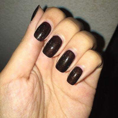 A little over one week old & my gel manicure still looks good! Gel polish Color: 240-Dark brown with gold shimmer/glitter.