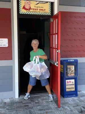 Customer delivering food for her community