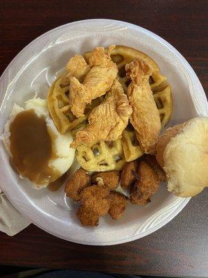 Chicken and waffles with corn bites and mashed potato