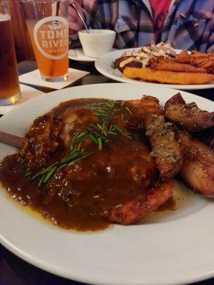 Whiskey chicken with garlic parmesan Washington fries