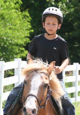 Lucas works on his canter on Sugar