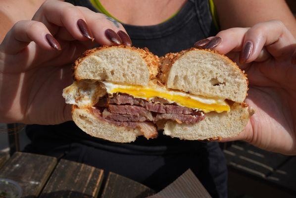 Pastrami Egg Cheese on an onion bagel