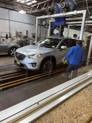 My car getting dried off at the end of the wash