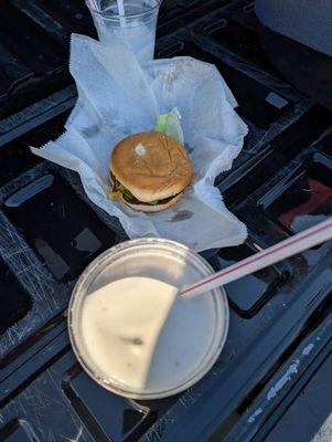 Banana shake, double cheeseburger with lettuce and onion