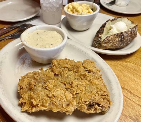 Early Dine $11.99, Country Fried Sirloin w/ white cream gravy on the side.  Baked Potato side & Macaroni and Cheese side(.99 extra).