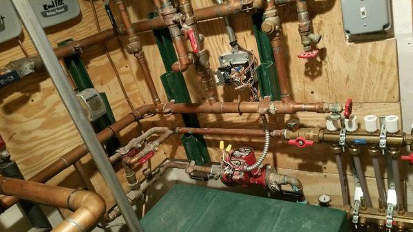 Radiant floor heat and baeboard control piping.