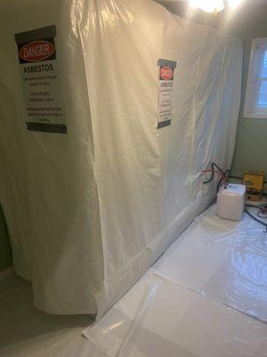 Asbestos tile removal.