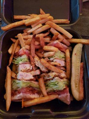 Grilled chicken club to-go, fries and a pickle